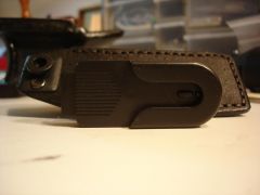 MOLDED FLASHLIGHT SHEATH WITH SWIVEL CLIP