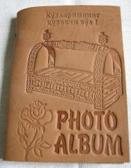 Leather photo album with uzbek cradle.