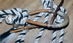 Peanut and Dark Rawhide Hackamore set - varigated rope to match, backbraided hanger.jpg