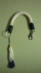 Knitted key strap with leather ends and tassel