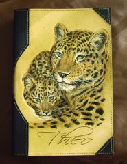 Bible cover with leopards.