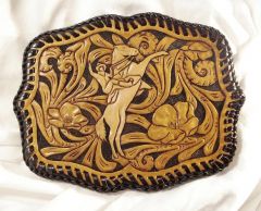 Tooled belt buckle with laced edge