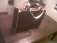 wife's leather tote bag