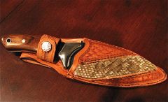 Knife sheath with rattlesnake inlay