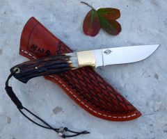 custom drop poing hunter with basketweave sheath