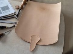 Flap and billet, showing creasing and "pricking"