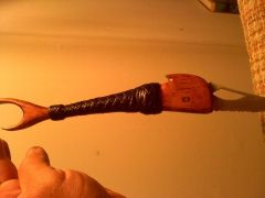 homemade knife with goatskin knotwork.