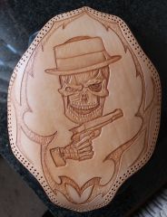 winking skull carving