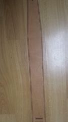 backside of first guitar strap