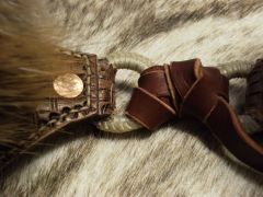 Metal Dees hand braded with rawhide