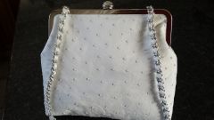 white ostrich leather clutch