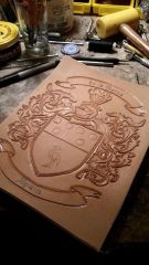 How much does an 8.5x11 family coat of arms sell for?