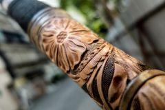 Handmade bow with tooled leather