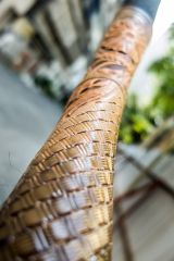 Handmade bow with tooled leather