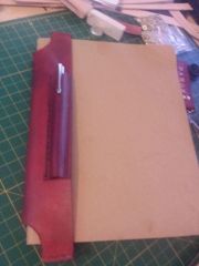 Moleskine notebook page/pen keeper