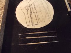 Modeling tools and saw blade for knifemaking.
