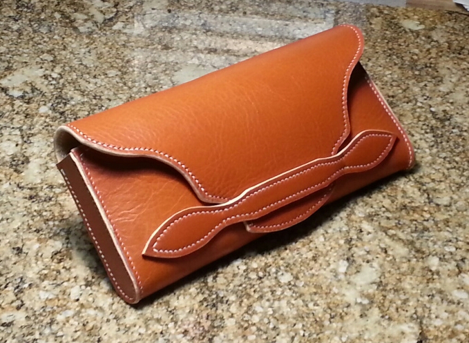 OrangeClutch.jpg.a1afdc499d8104ac2df3e65a02e758b3.jpg