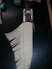 Fringed knife sheath for custom knife.jpg