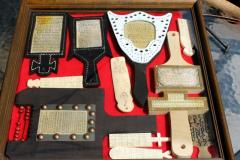 The leather books are the two in the top left hand side