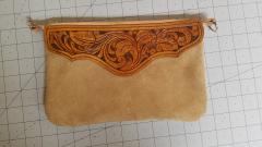 Suede wristlet with floral tooling