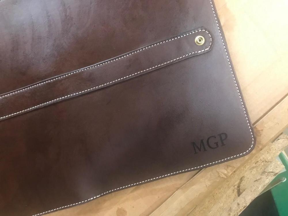 etched leather portfolio front.jpg