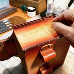 Stitching up Skeet Shooting leather case.jpg