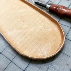 Bottom of veg-tan purse, wet and formed.jpg