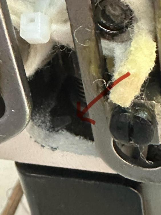 Broken part in machine.jpg